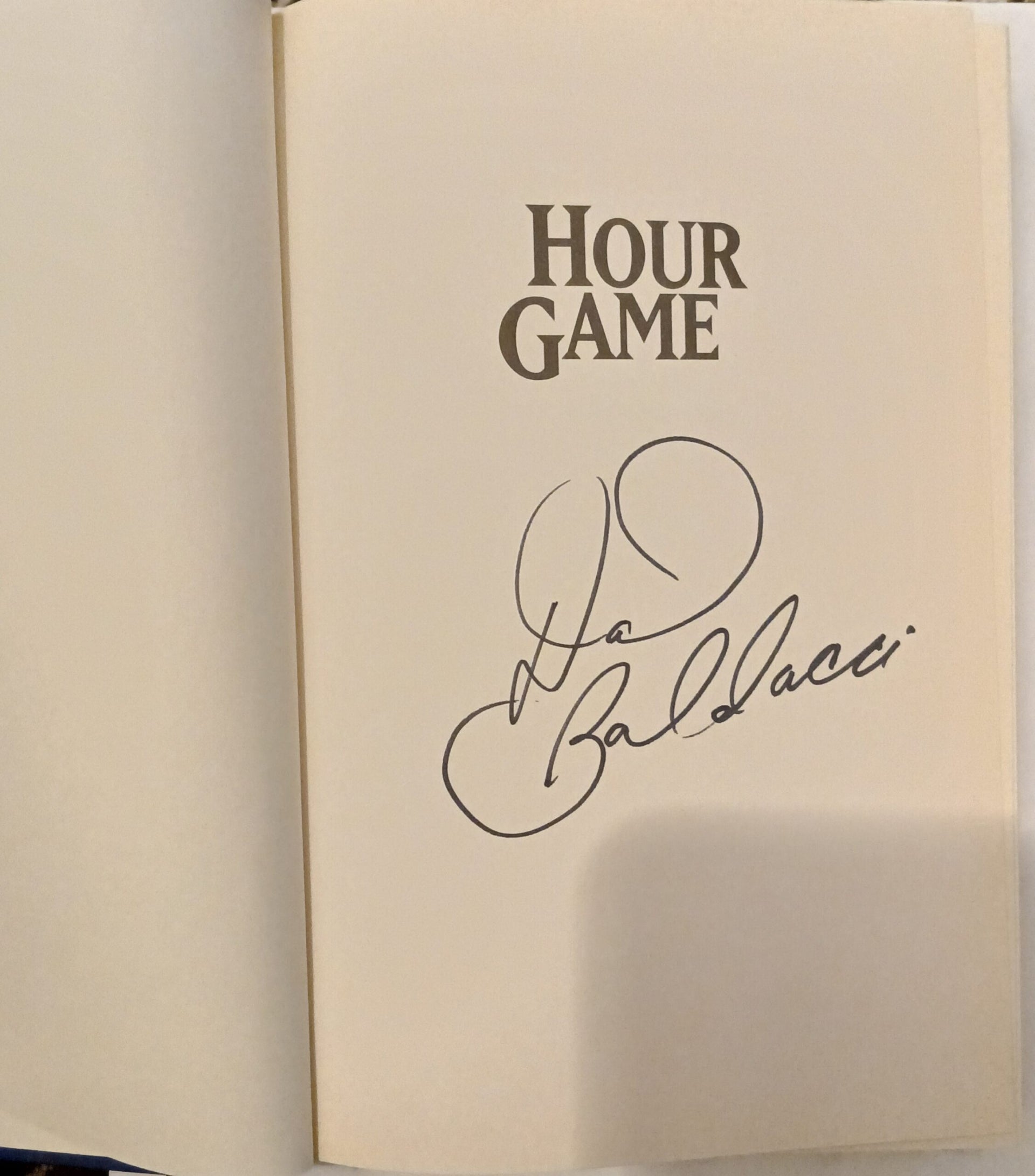 Hour Game by David Baldacci- Hardcover – 1st Printing October, 2004. Signed Copy Hour Game by David Baldacci- Hardcover – 1st Printing October, 2004. Signed Copy