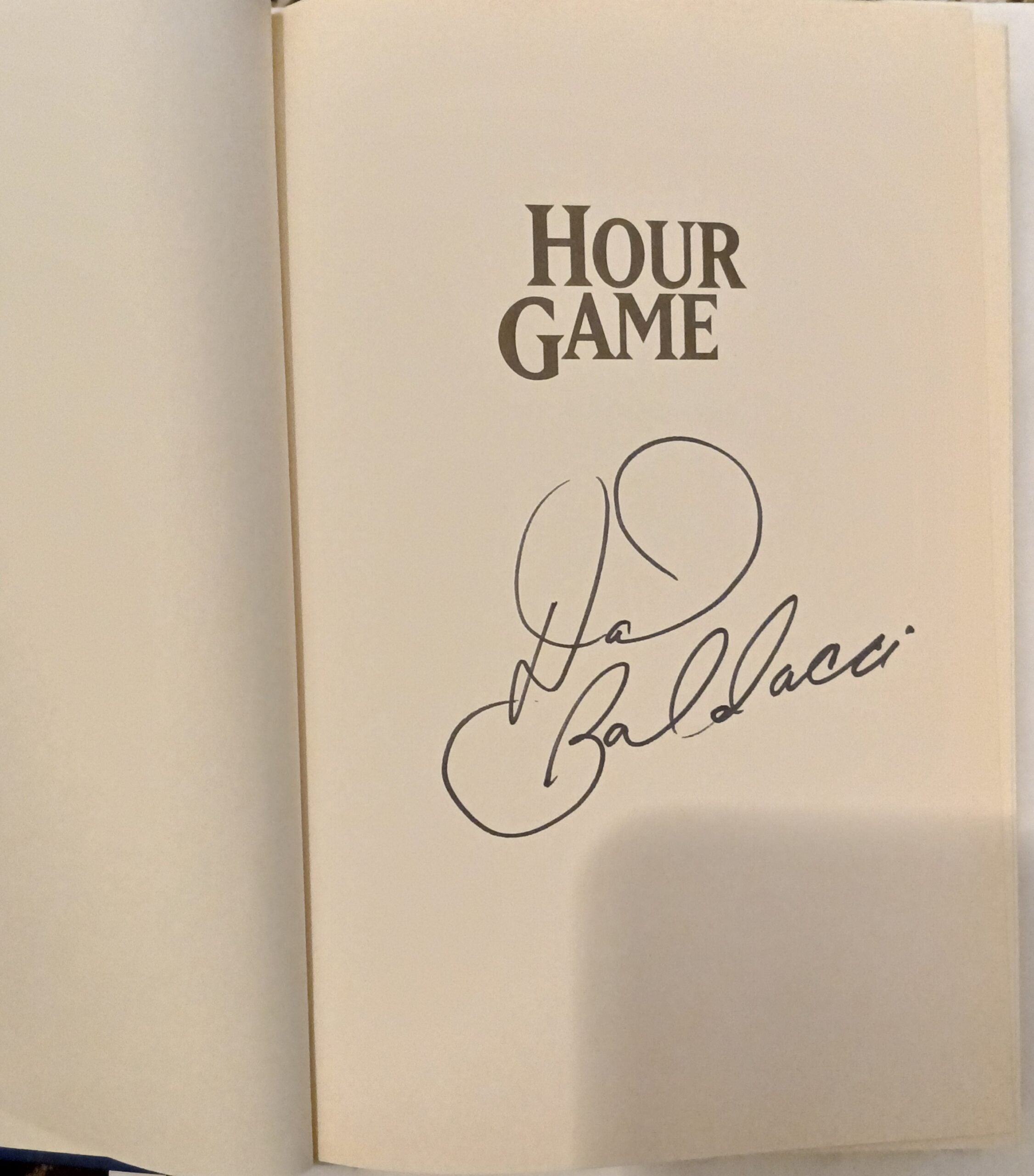 Hour Game by David Baldacci- Hardcover – 1st Printing October, 2004. Signed Copy