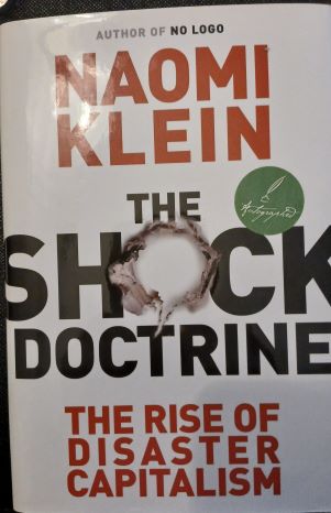 The Shock Doctrine: The Rise of Disaster Capitalism Hardcover – 1st Ed. September 18, 2007-Signed Copy